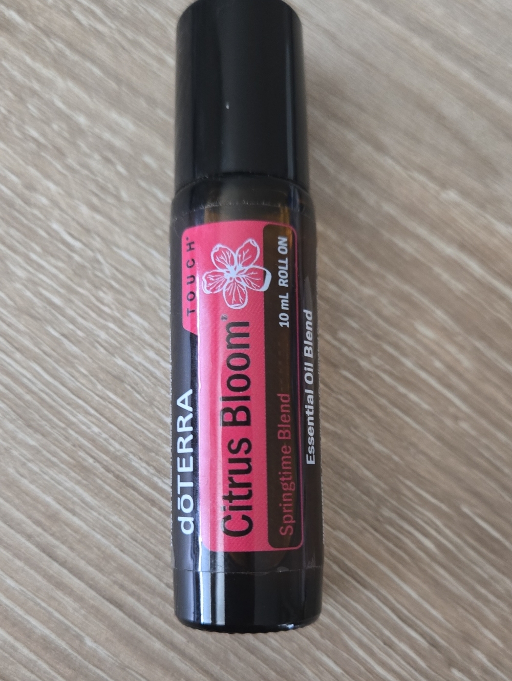 Doterra Citrus Bloom Roll-On with Coral-Pink Label
